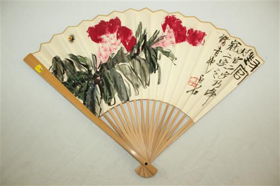 A Chinese bamboo and painted leaf fan, 31.5cm